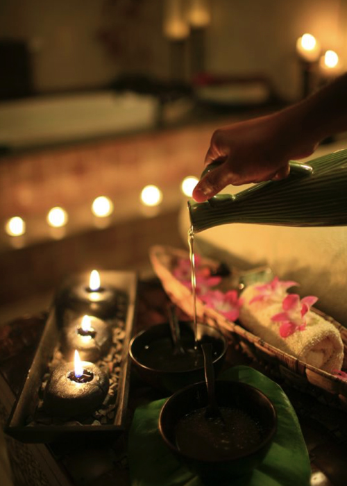 Sala massaggi asciugamano da tavolo per massaggi e candele